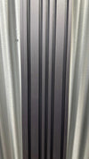 Black matte carbon fiber WPC wall panel with textured surface, curled edges, modern design, available in NJ.