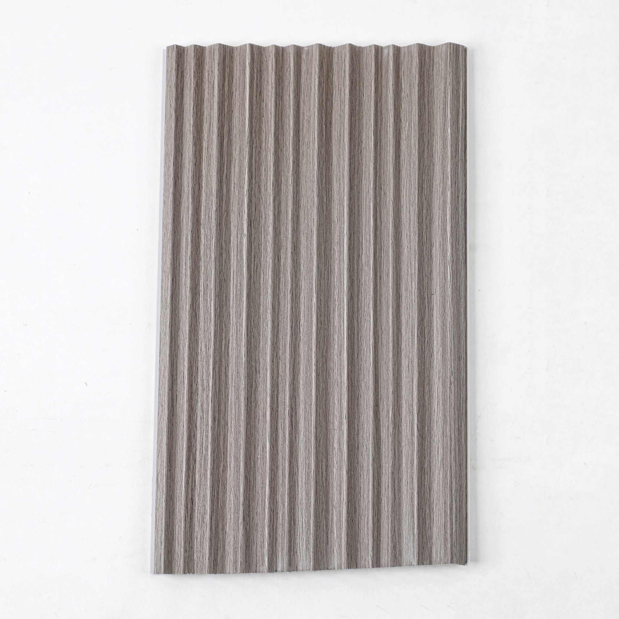 Dark grey corrugated WPC wall panel with ribbed texture, sleek design, maintenance-free, ideal for NJ homes.