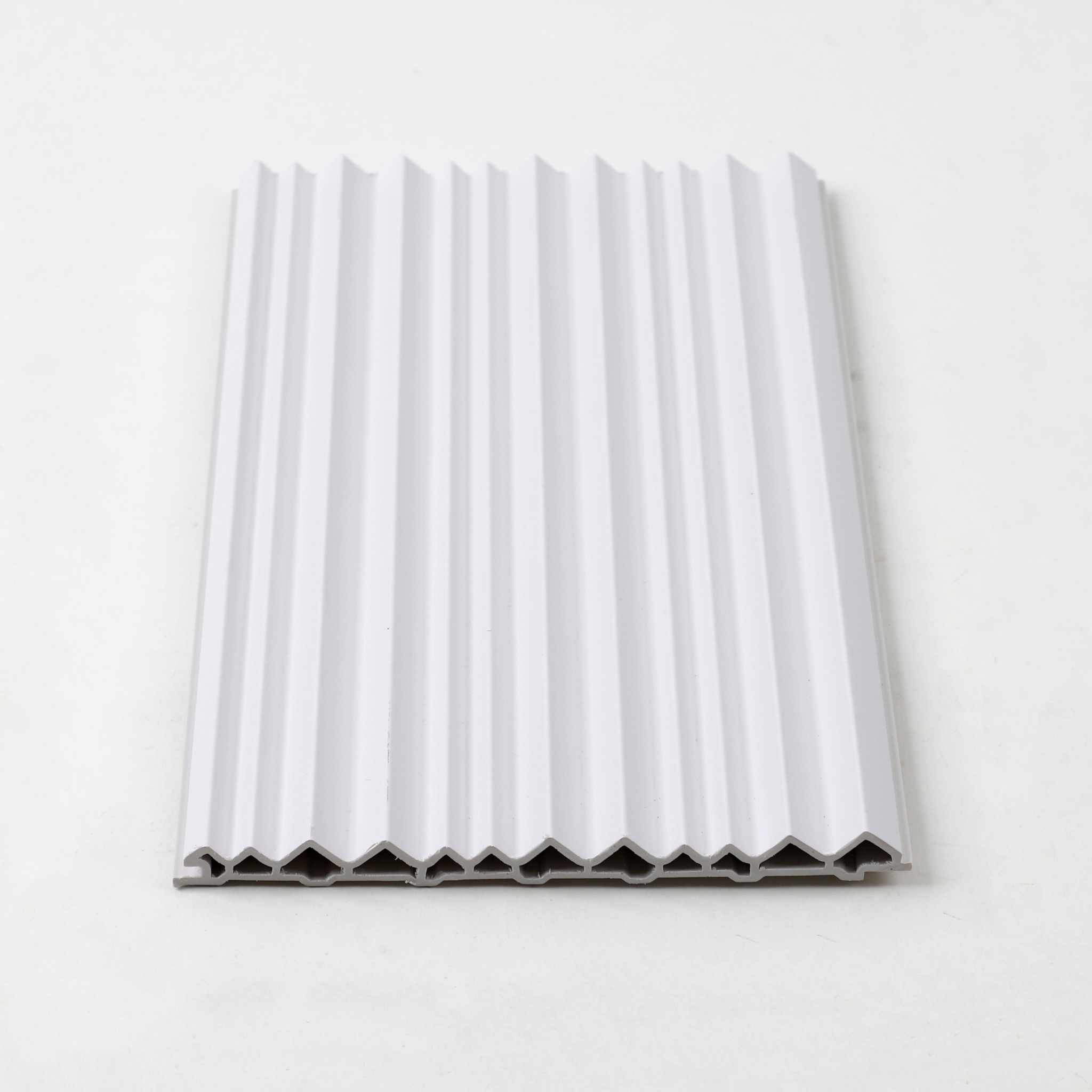 White ribbed WPC wall panel with a sleek, curved design, maintenance-free and durable, perfect for NJ homes and businesses