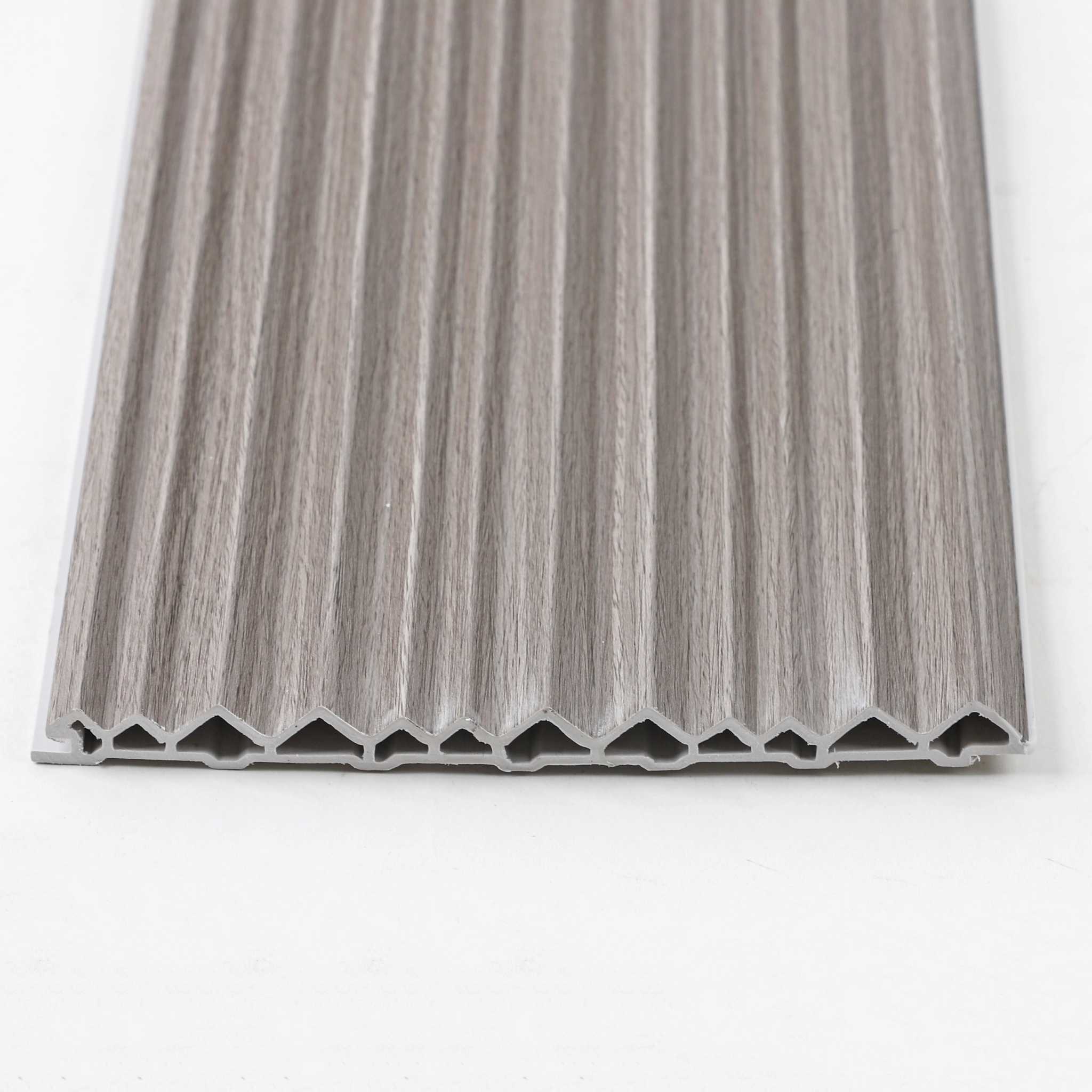 Brown and gray ribbed WPC wall panel with sleek, maintenance-free design, durable for NJ weather conditions.