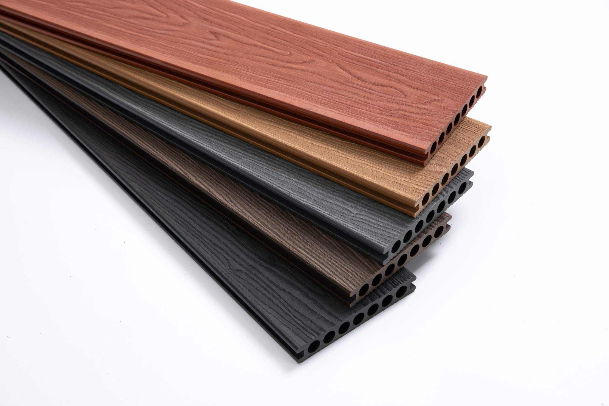 Stack of 5 teak composite deck boards in brown, grey, black, grooved surface, durable co-extruded Ultra Guard, NJ.