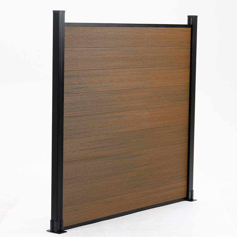 Brown composite fence with horizontal walnut-style planks, supported by black metal posts, available wholesale in NJ.