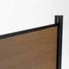 Brown composite fence with horizontal walnut-style planks and black metal posts, durable and stylish, available in NJ.