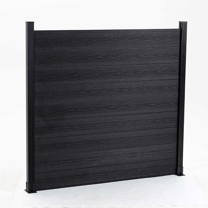 Black composite fence with horizontal planks, slight color variation, durable co-extrusion design, perfect for NJ homes.