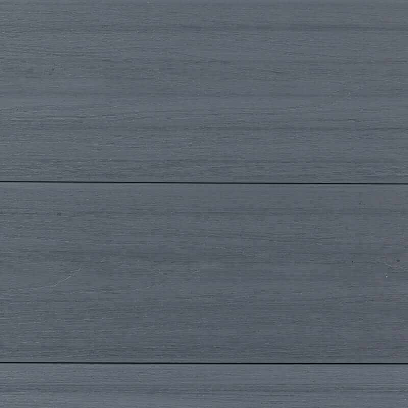 Light gray composite fence with co-extrusion design, durable and stylish, perfect for NJ homes, resembling blue wooden plank