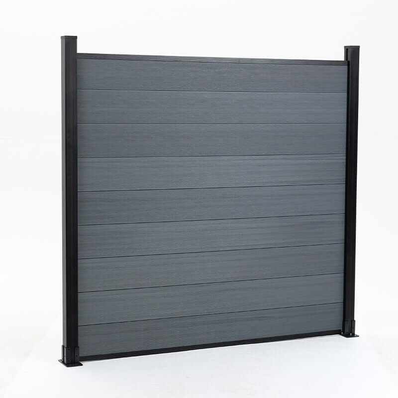 Light gray composite fence with wood grain texture, supported by black metal posts, available at discounted prices in NJ. 464