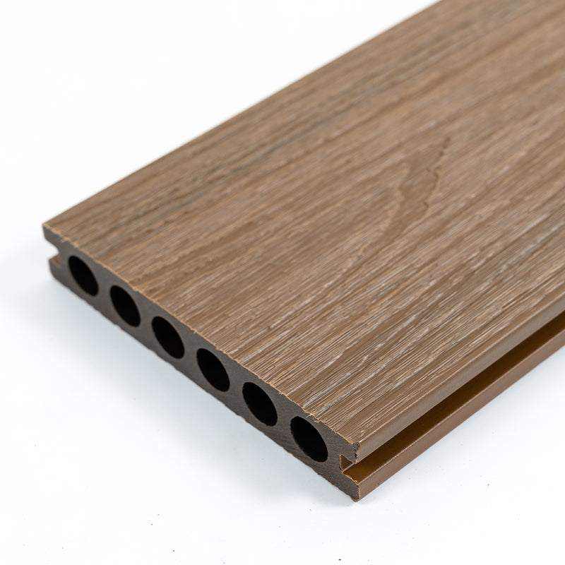 Brown composite deck board with wood grain texture, 1 in. thick, 5.5 in. wide, beveled and grooved edges, durable for NJ