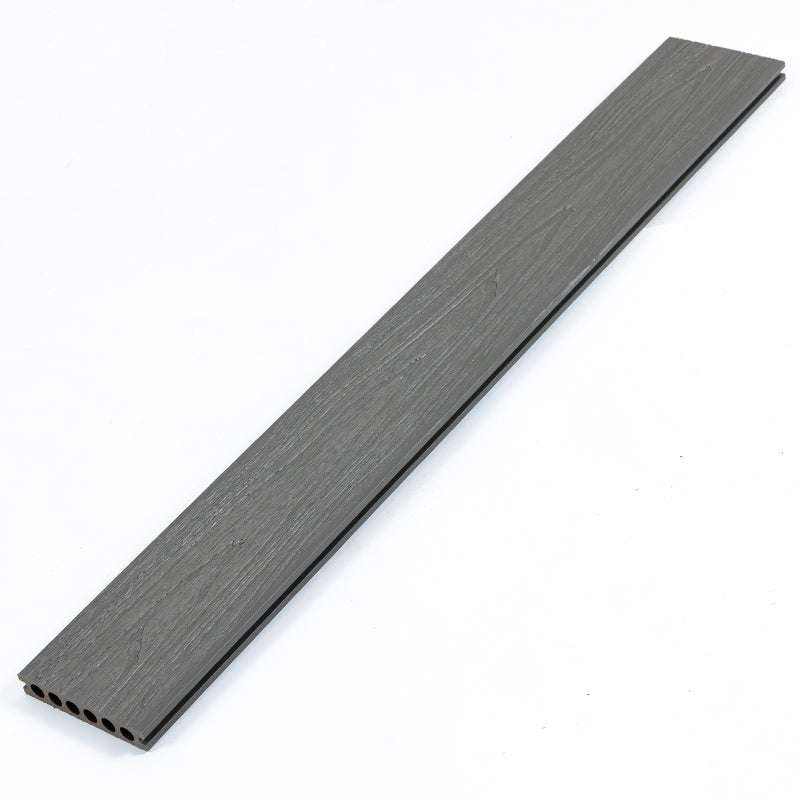 Dark gray composite deck board with grooved surface, 16 ft long, 5.5 in wide, 1 in thick, durable wood-plastic material in