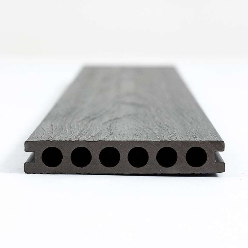 Dark gray composite deck board with wood grain texture, hollow design, ribbed underside, durable and stylish for NJ homes