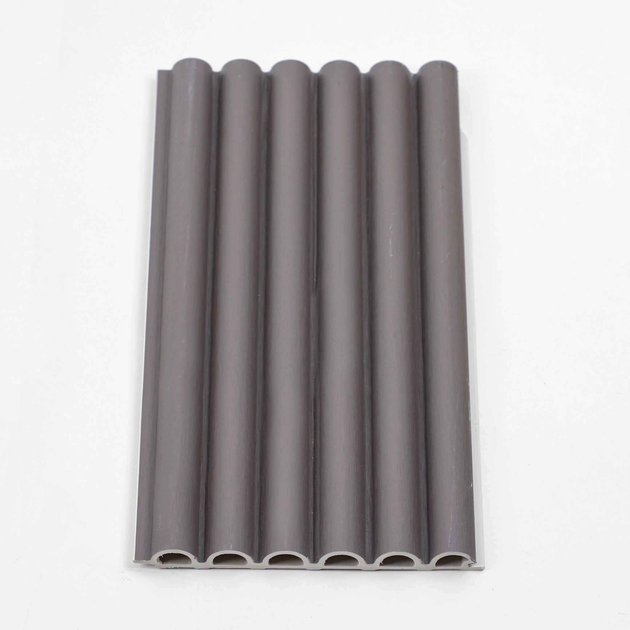 Dark gray WPC corrugated sheeting with vertical ribbed texture, high-quality round hole design, available in NJ.