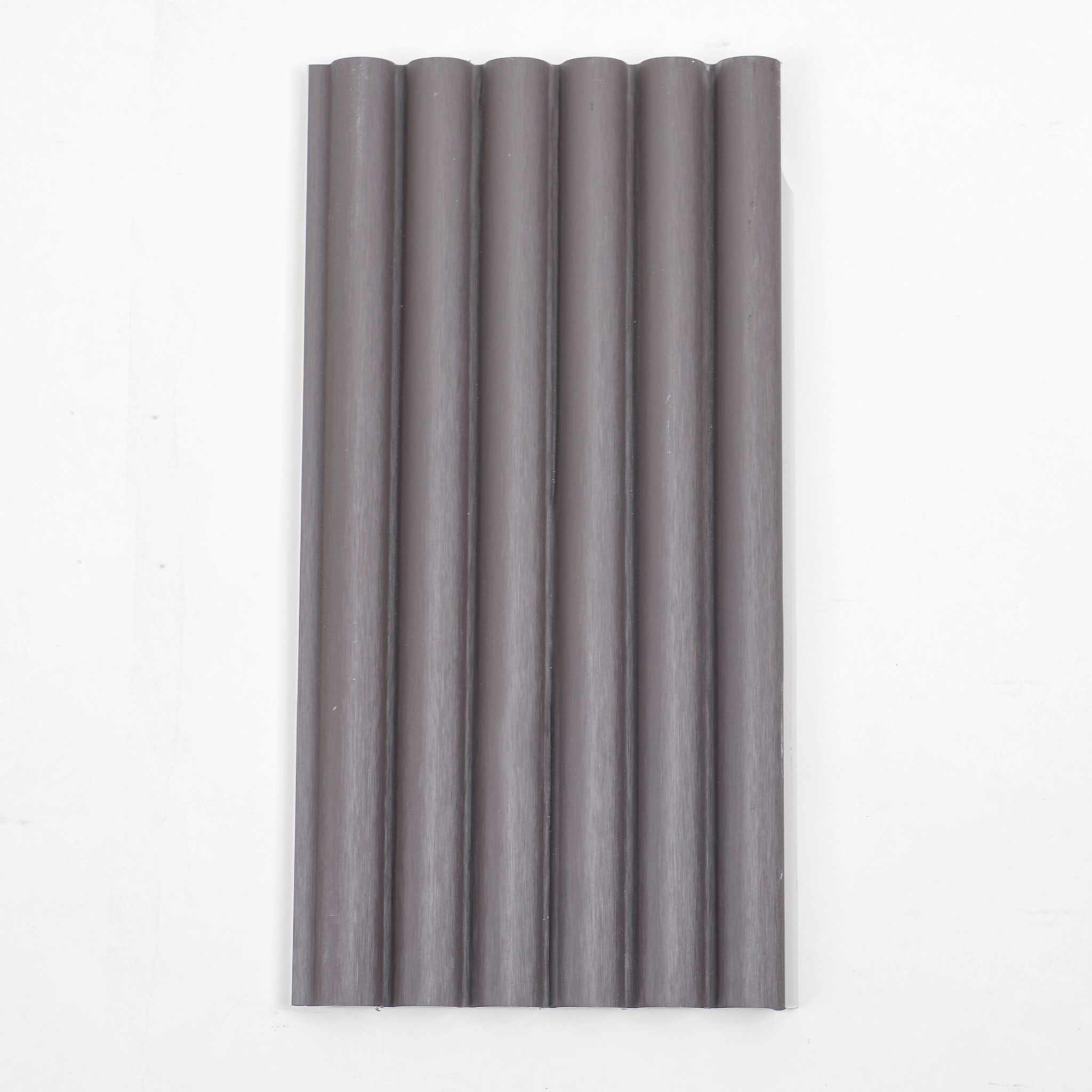 Dark gray corrugated WPC sheet with ribbed texture and round hole design, high-quality material, available in NJ.