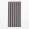 Dark gray corrugated WPC sheet with ribbed texture and round hole design, high-quality material, available in NJ.