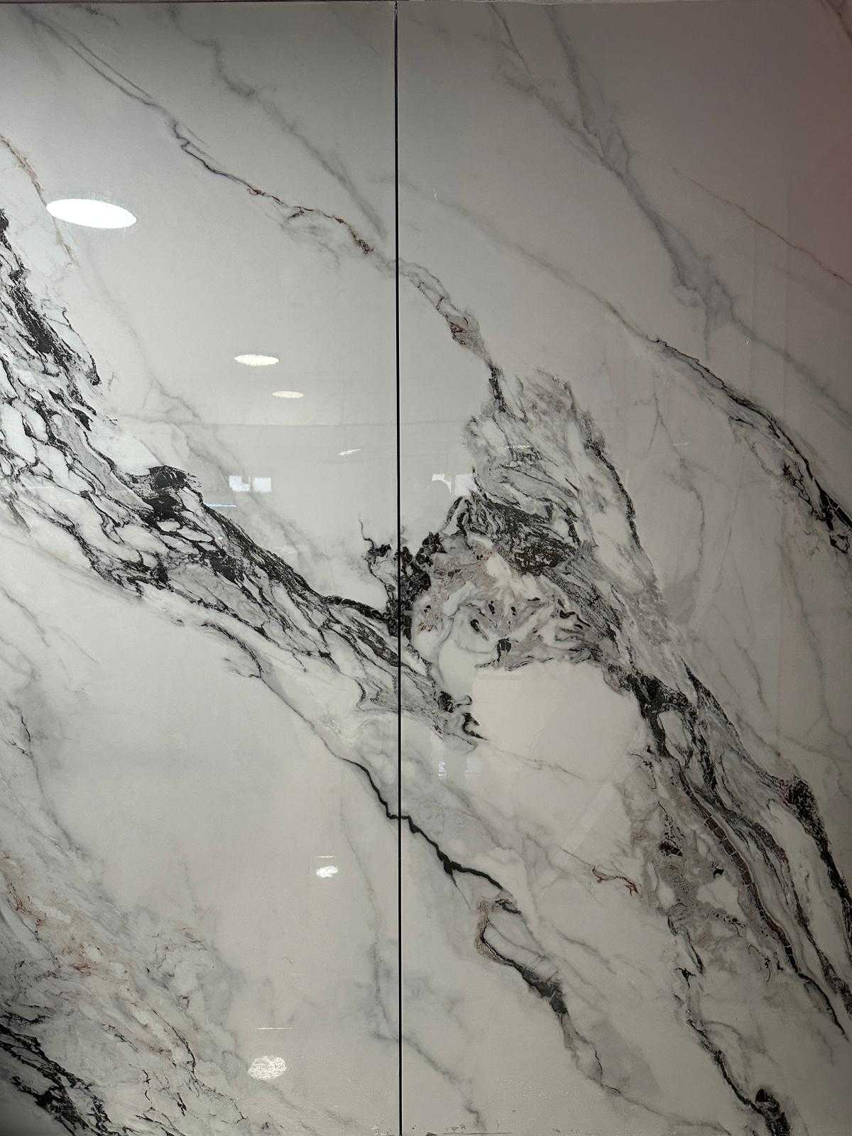 White marble bamboo veneer panels with glossy black & gray veins, book match pattern, 9x4 feet, installed vertically in NJ