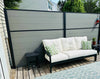 Silver gray composite fence with sleek co-extrusion design, perfect for NJ decks, offering privacy, durability, and modern